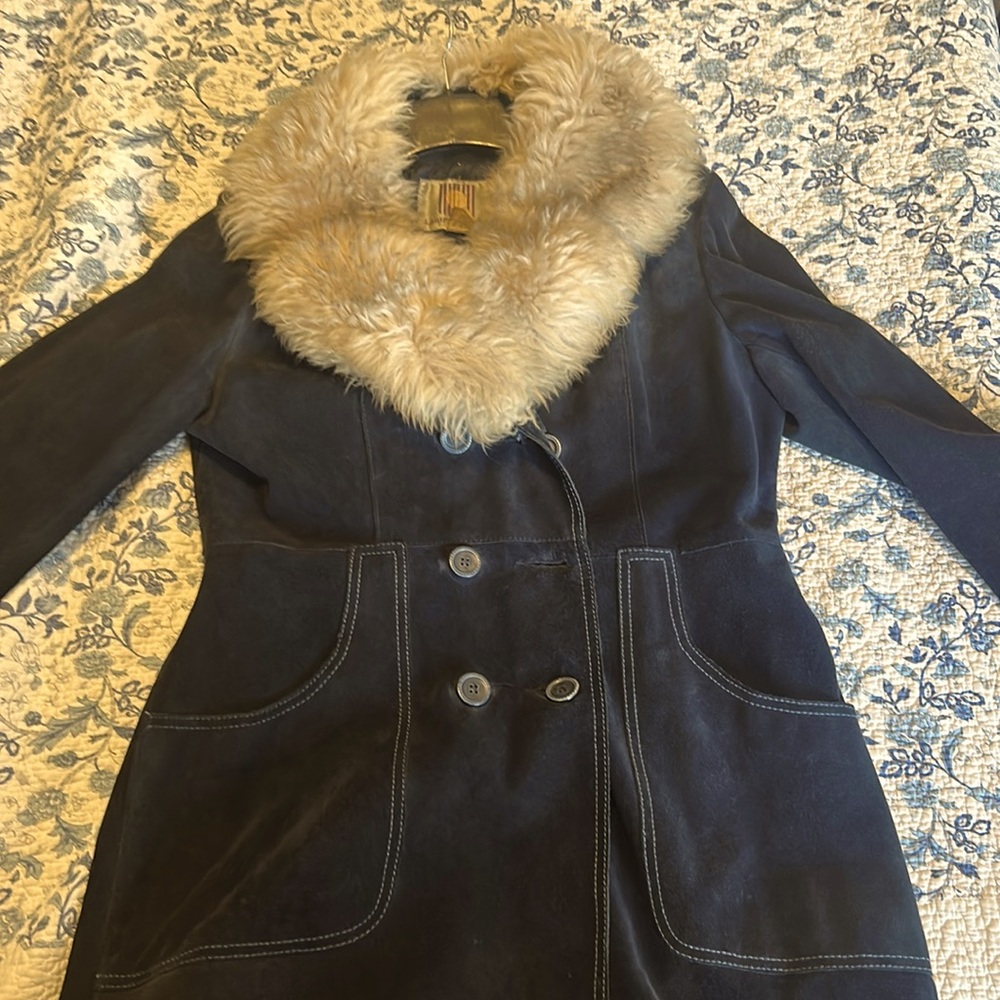 Blue suede jacket with a gray fake fur collar in almost perfect condition.